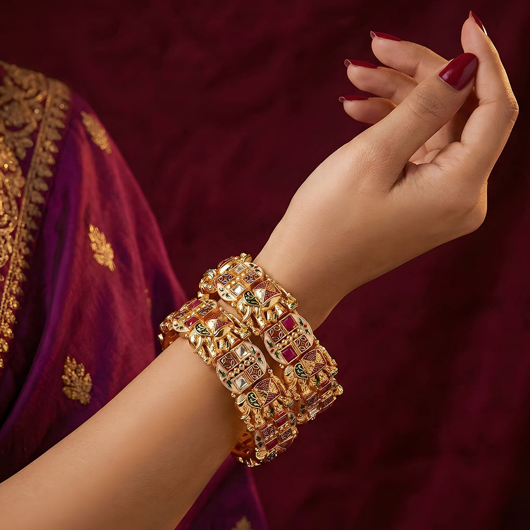 Gold Plated Stylish Metal Bracelet with Elephant & Kundan Design