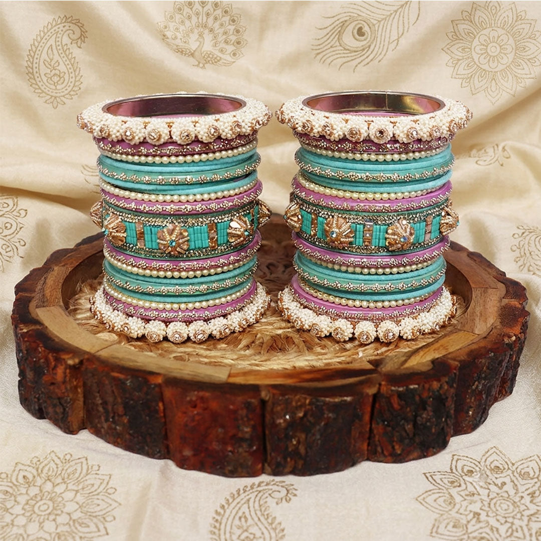 Designer bridal bangles set with Pearl, Kundan and Rhinestone detailing by TAJ BRIDAL STORE