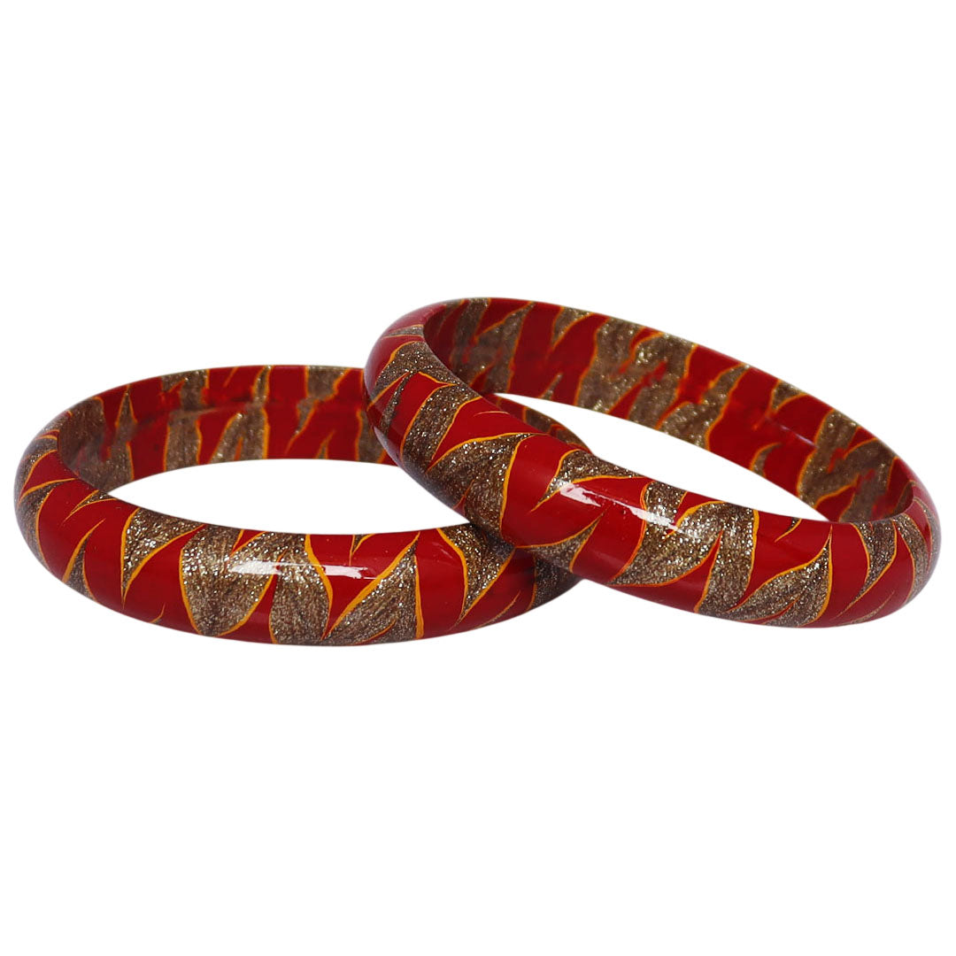 Designer lac bangles set with red and golden swirl pattern
