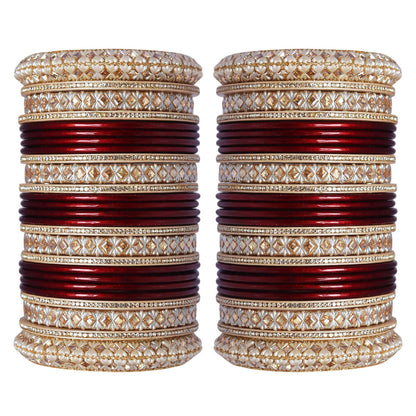 Maroon and red Punjabi-style bridal bangles set with Kundan-style decorative work by Taj Bridal Store.