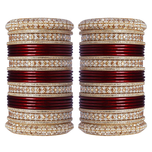 Maroon and red Punjabi-style bridal bangles set with Kundan-style decorative work by Taj Bridal Store.