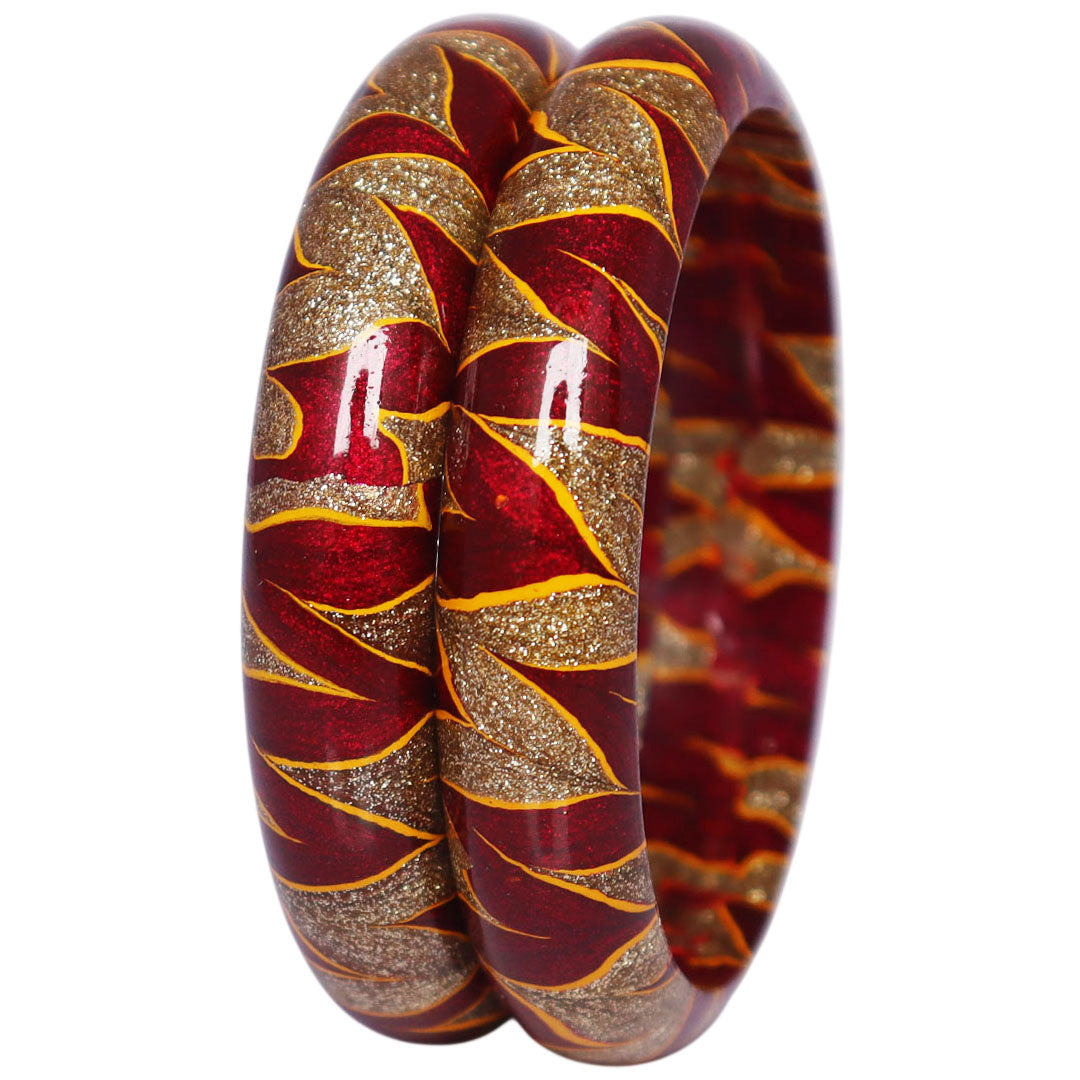 Rajasthani designer lac bangles with glittery golden swirl detailing