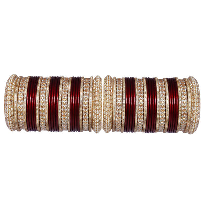 Premium maroon and red bridal chooda set featuring ivory-toned patterns and gold-tone detailing.