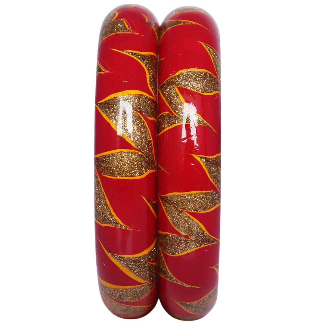 Rajasthani bridal lac bangles with golden swirl design