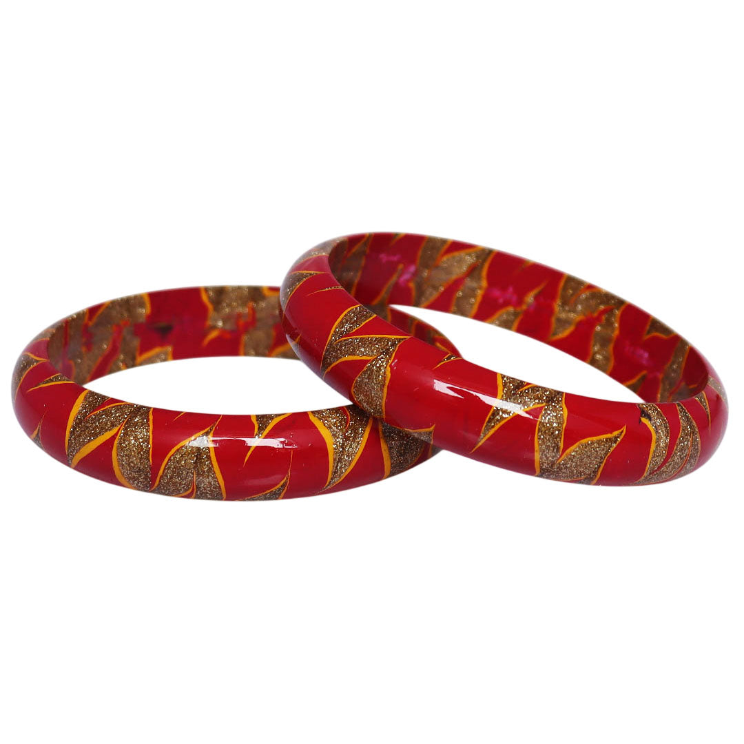 Rajasthani bridal lac bangles with golden swirl design