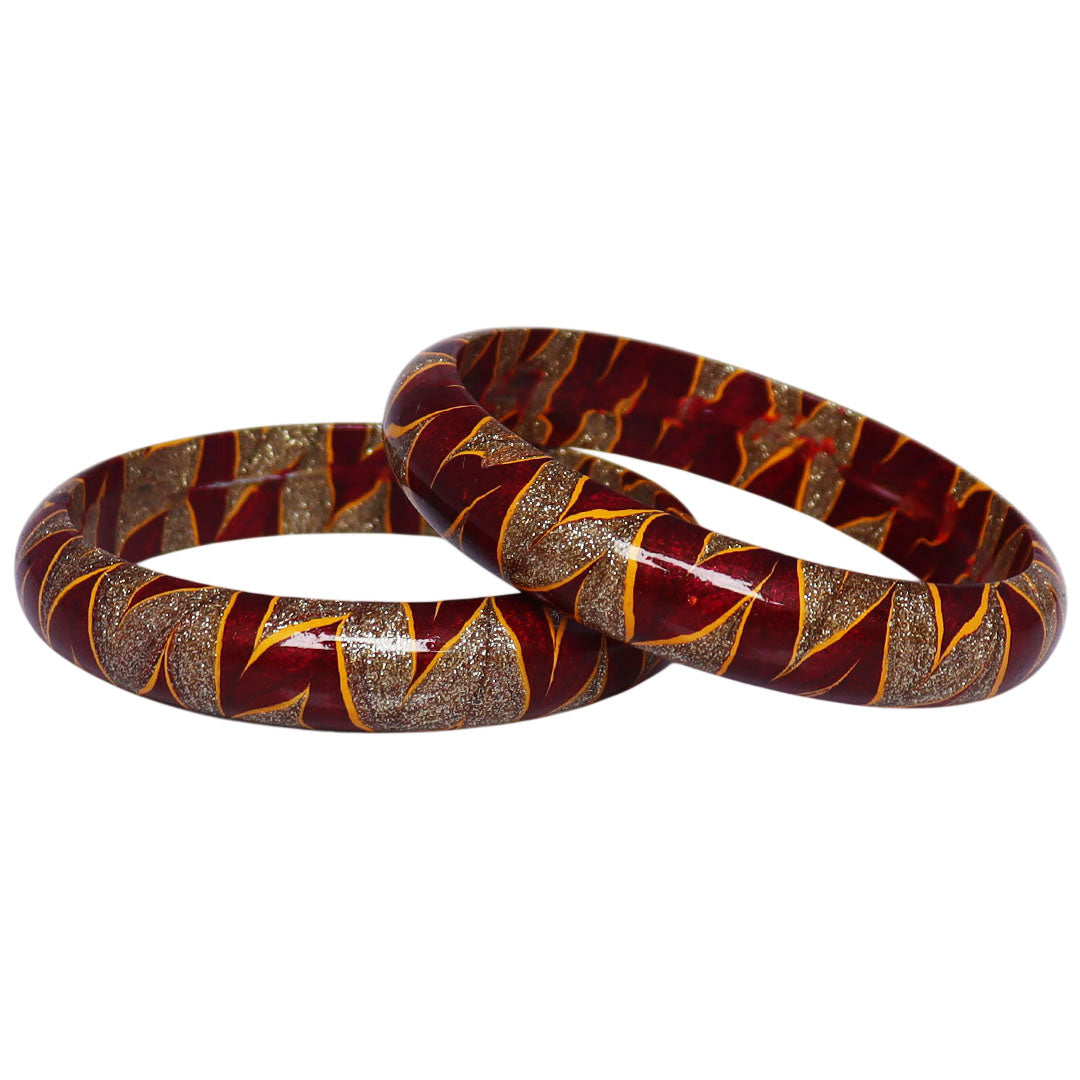 Rajasthani designer lac bangles with glittery golden swirl detailing