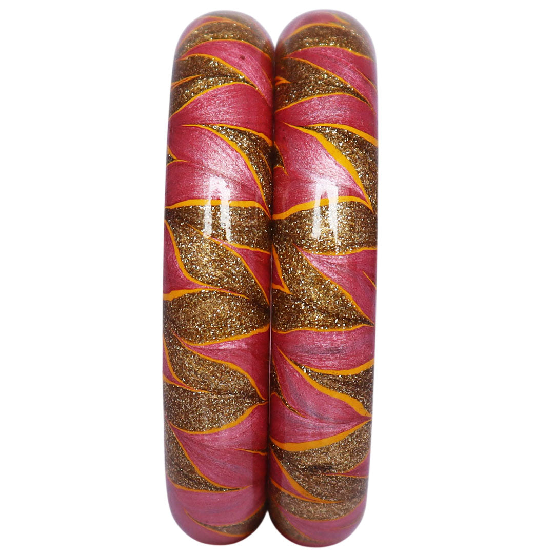 Rajasthani designer lac bangles with glittery golden swirl detailing