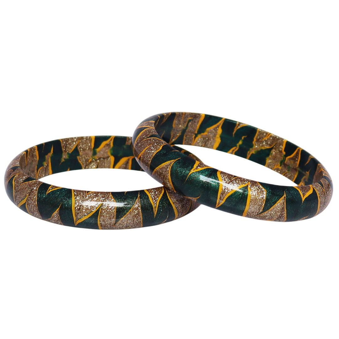Traditional Indian lac bangles with glittery golden detailing