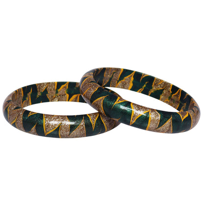 Traditional Indian lac bangles with glittery golden detailing