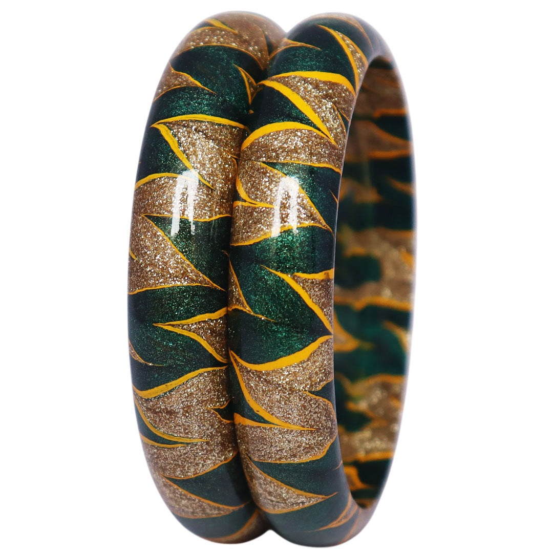 Traditional Indian lac bangles with glittery golden detailing